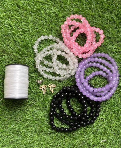 500 Deal 2 strands crack beads , 2 strands of glass beads , elastic cord , magnet heart and 2 random charms | Deal