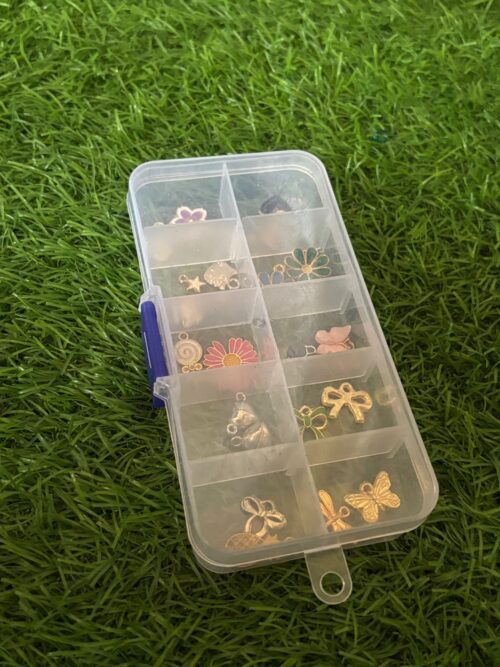 Charm Kit Contains 20 Charms with  the 10 grid box